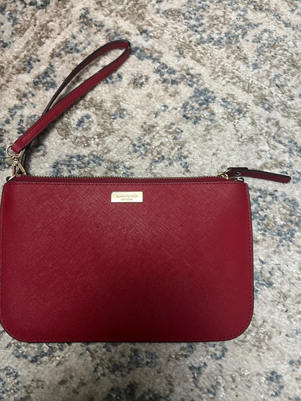 kate spade red saffiano wristlet with gold hardware